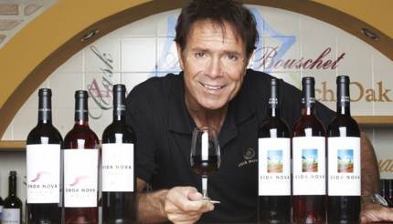 Sir Cliff Richard with his wine in his winery, Vida Nova
