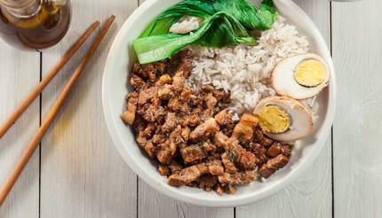 Lu rou fan over rice with boiled egg and pak choi