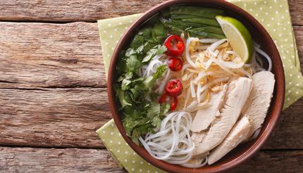 Vietnamese pho ga with chicken and rice noodles, bean sprouts and chillies