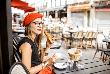 Enjoying a croissant and coffee in France