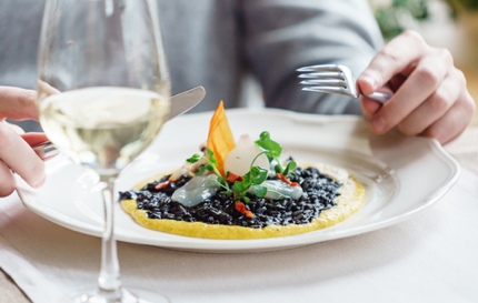 Enjoying squid ink risotto