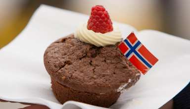 cupcake with Norwegian flag vanilla cream and fresh organic raspberry