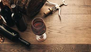 Wine glasses, corkscrew and barrel
