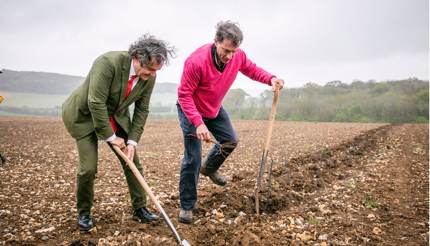 Pierre-Emmanuel Taittinger (left) and Patrick McGrath planting the first vine at Domaine Evremond/ thomasalexanderphotography.co.uk
