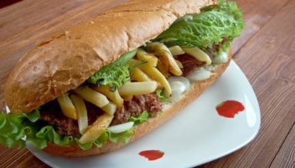 Gatsby sandwich - french fries, meat, lettuce and onions