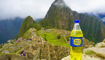 Inca Kola with Inca temples in background