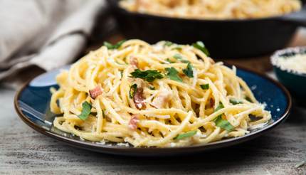 Spaghetti carbonara with egg and pancetta