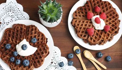 Waffles with berriesWaffles with blueberries and raspberries on cream